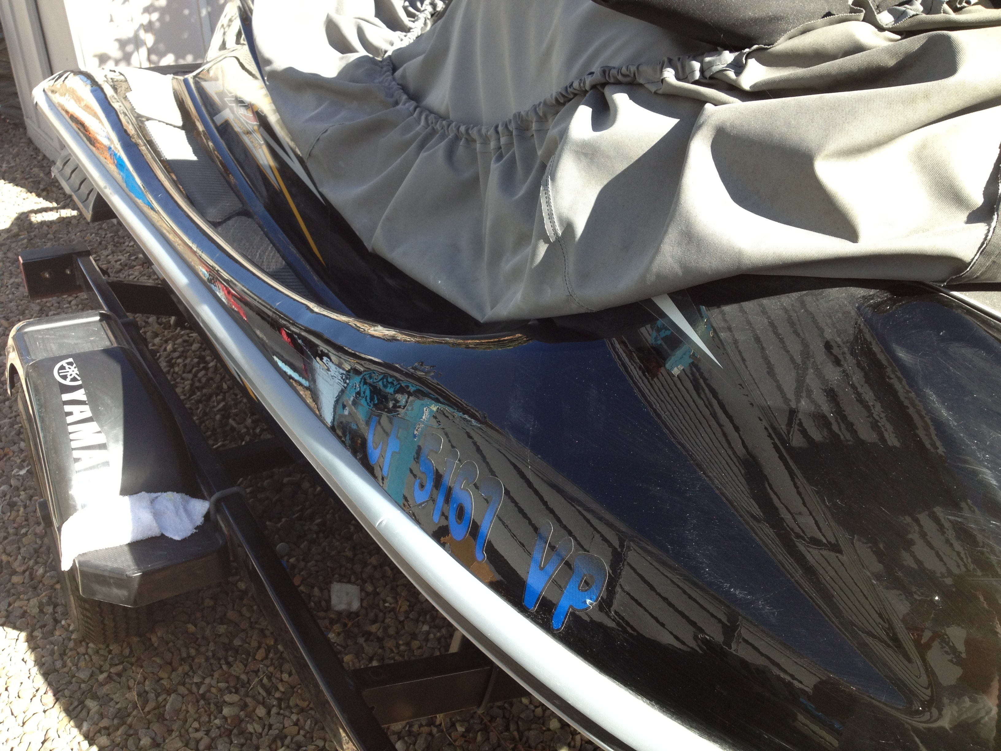 Step 13 — PWC registration numbers and hull damage, San Diego Yacht Repair